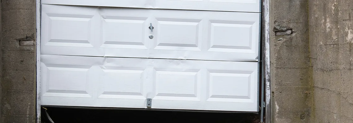 Garage Door Got Hit By A Car Dent Removal in Aurora, ON