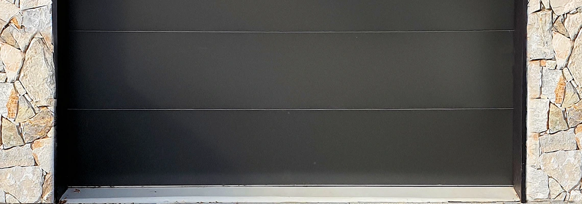 Overhead Black Garage Door Installation in Aurora, Ontario